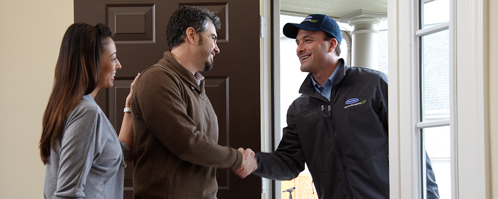 Carrier Rep shaking hands with Customers